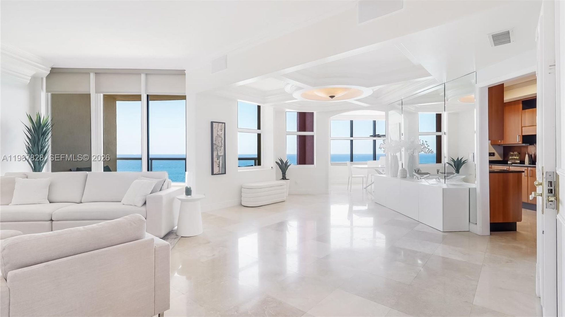 Living room of Unit 20D at 2100 N Ocean Blvd with ocean views
