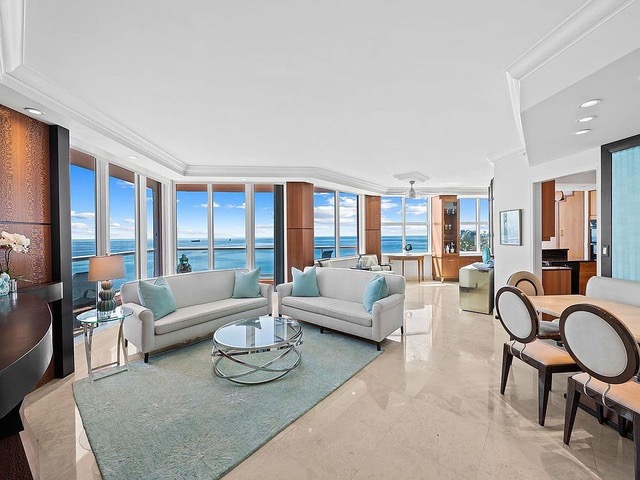 Living room of Unit 21B at The Palms with ocean views